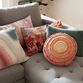 Round Yellow And Orange Concentric Throw Pillow image number 1
