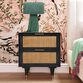 Chrisney Black Wood and Natural Cane Nightstand With Drawers image number 1